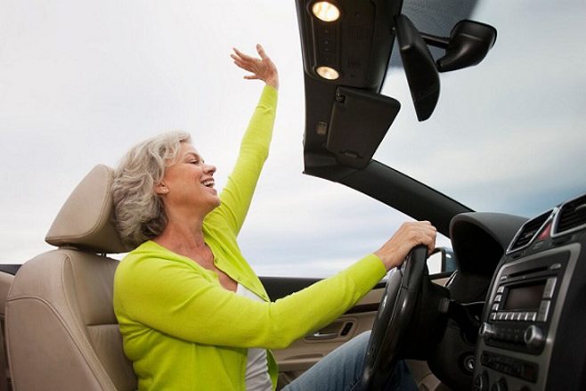 woman driving in convertible woman driving in convertible